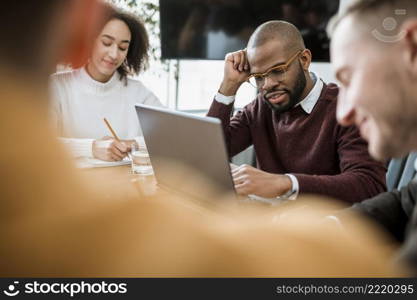 people table office during meeting