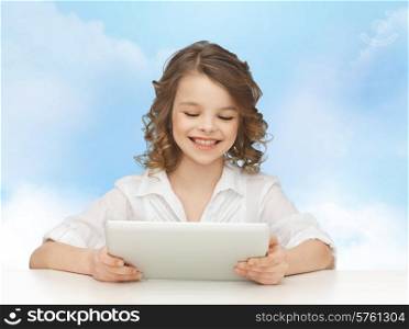 people, technology and children concept - happy smiling girl with tablet pc computer over blue sky background