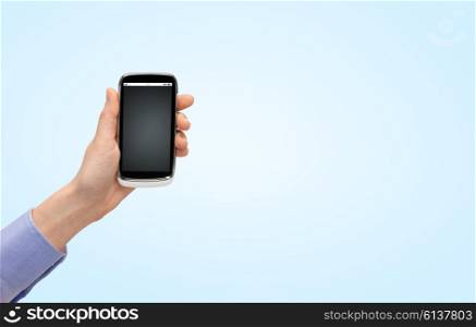 people, technology and media concept - close up of woman hand holding smartphone with blank black screen