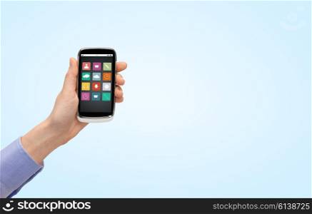 people, technology and media concept - close up of woman hand with smartphone with application icons on screen