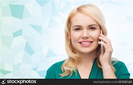 people, technology, communication and leisure concept - happy young woman calling on smartphone over blue low poly background