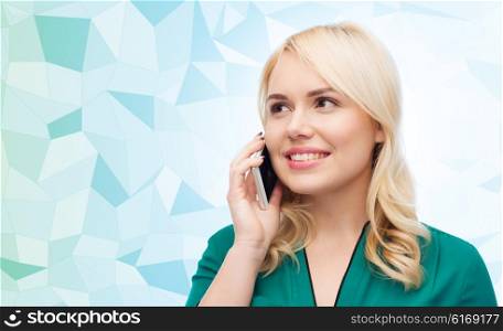 people, technology, communication and leisure concept - happy young woman calling on smartphone over blue low poly background