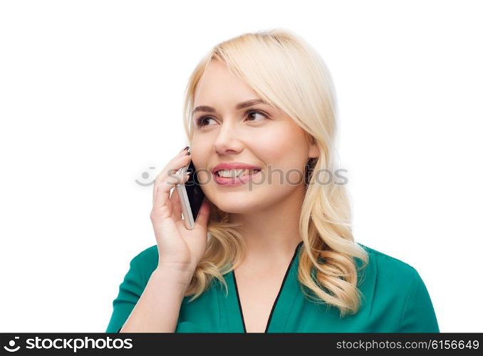 people, technology, communication and leisure concept - happy young woman calling on smartphone