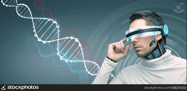 people, technology, future and progress - man with futuristic 3d glasses and microchip implant or sensors over gray background and dna molecules