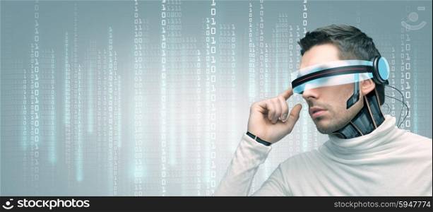 people, technology, future and progress - man with futuristic 3d glasses and microchip implant or sensors over gray background over binary system code