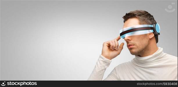 people, technology, future and progress - man with futuristic 3d glasses over gray background