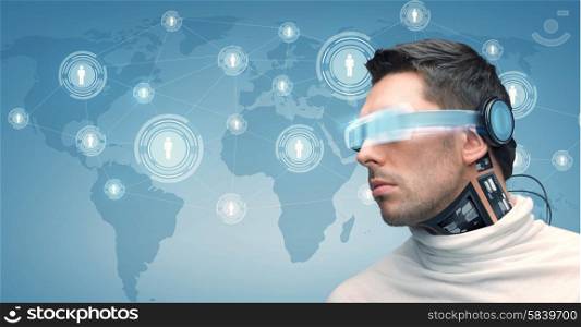people, technology, future and progress - man with futuristic glasses and microchip implant or sensors over blue background with world map and network contacts icons