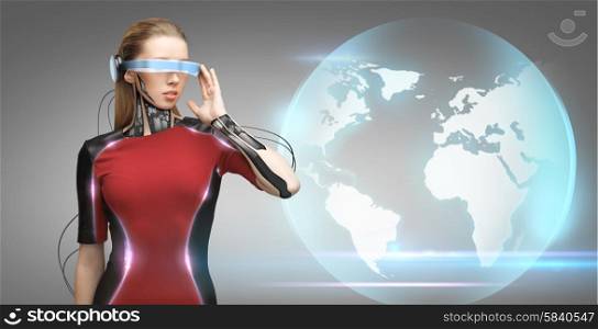 people, technology, future and progress - young woman with futuristic glasses and microchip implant or sensors over gray background over blue earth globe hologram