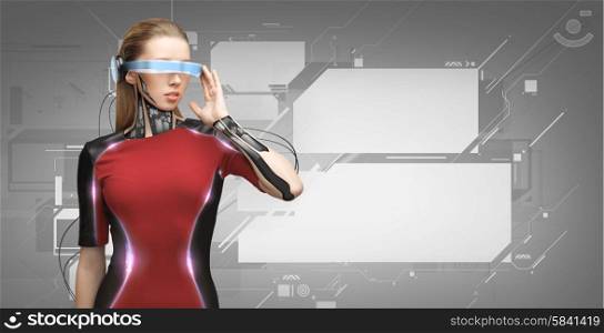 people, technology, future and progress - young woman with futuristic glasses and microchip implant or sensors over gray background with virtual screens