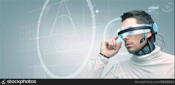 people, technology, future, engineering and progress - man with futuristic 3d glasses and microchip implant or sensors over gray background with golden section on virtual screen