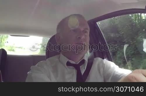 People, travel, happy man on road trip, manager, euphoric driver, businessman driving car on the street, singing song, shouting music tune for joy. 4 of 8