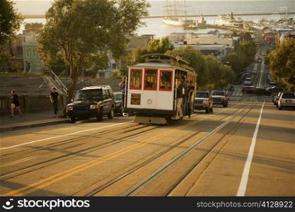 People traveling in a cable car, San Francisco, California, USA