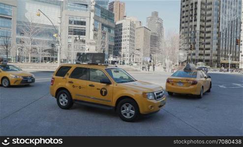 People use a taxi in New York City