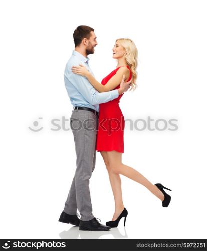 people, valentines day, love, couple and holidays concept - happy young woman and man hugging