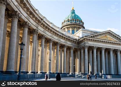 people walk to Kazan Cathedral in Saint Petersburg. people walk to Kazan Cathedral in Saint Petersburg city in March morning