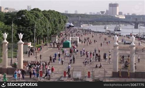 People walking at Park Kultury in Moscow, Russia. High angle wide shot.