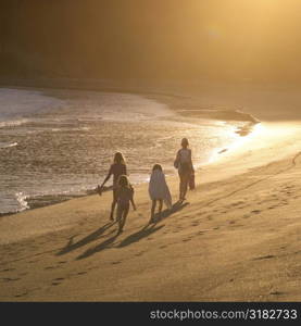 People walking down beach in Costa Rica