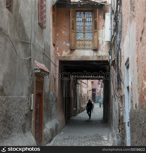 People walking in a narrow street, Medina, Marrakesh, Morocco