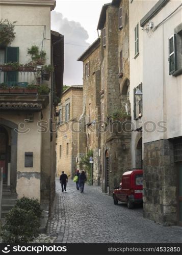 People walking in a narrow street, Orvieto, Terni Province, Umbria, Italy