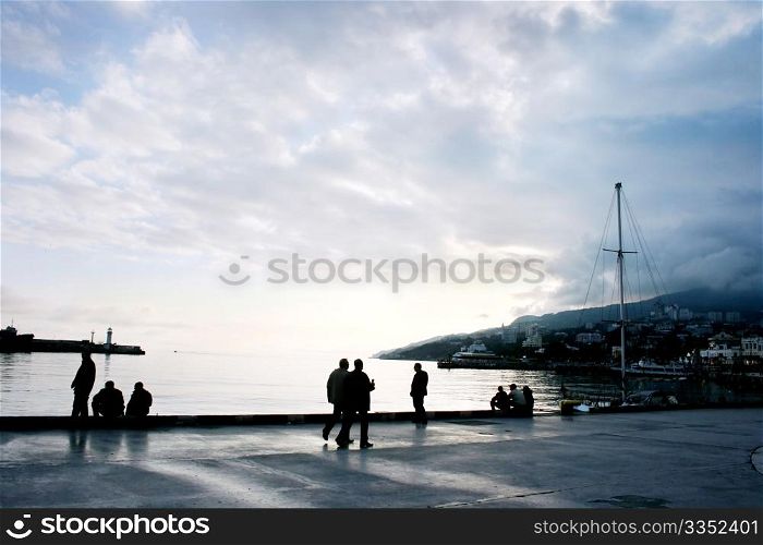 people walking on the embankment of Yalta
