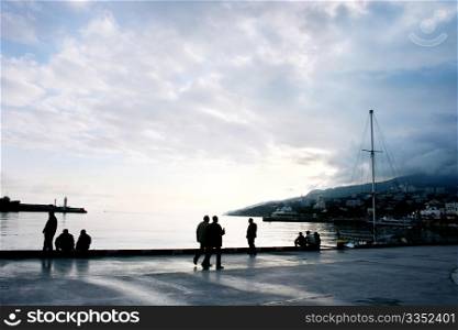people walking on the embankment of Yalta