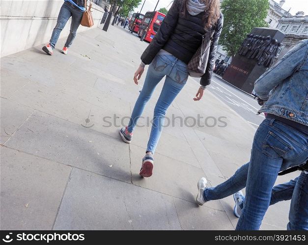 People walking. Unrecognisable people walking in urban scene