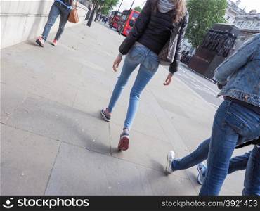 People walking. Unrecognisable people walking in urban scene
