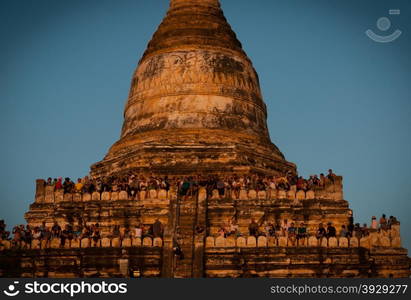 People watching Sunset at Shwesandaw Pagoda in Burma Myanmar. Sunset at Shwesandaw Pagoda in Burma Myanmar