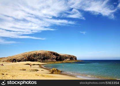 people water in lanzarote coastline froth spain pond rock stone sky cloud beach musk and summer