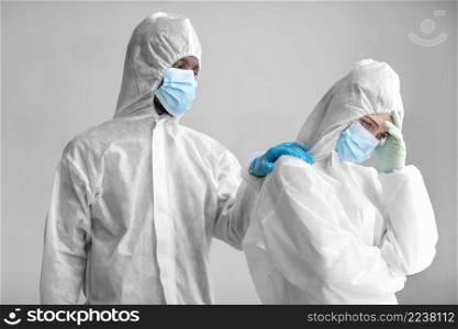 people wearing protective suit biohazard area
