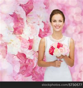 people, wedding, holidays and celebration concept - smiling bride or bridesmaid in white dress with bouquet of flowers over pink floral background