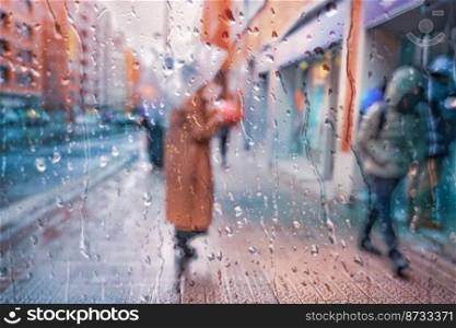  people with an umbrella in rainy days in Bilbao city, basque country, spain