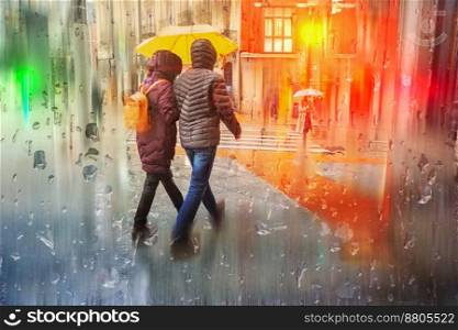 people with an umbrella in rainy days in Bilbao city, basque country, spain