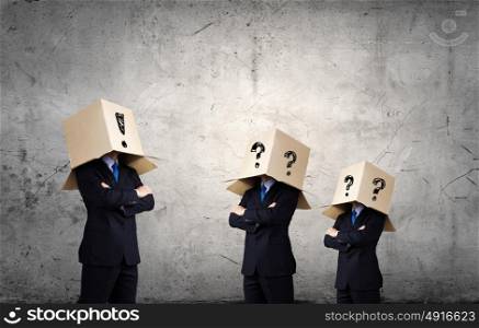 People with boxes on head. Business people with carton boxes on head