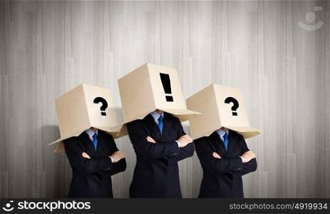 People with boxes on head. Business people with carton boxes on head