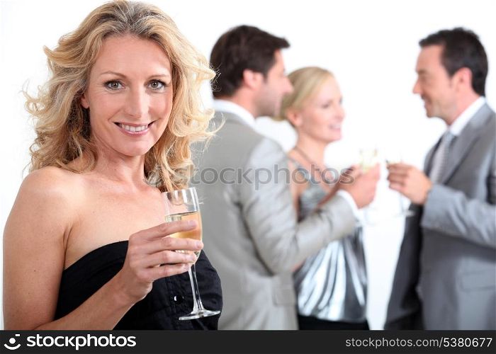 People with drink in hand