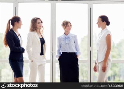 people, work and corporate concept - business women meeting at office and talking
