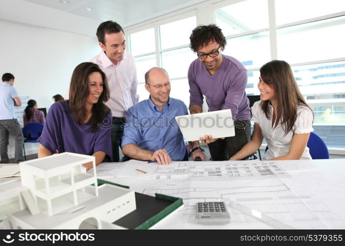 People working in an architect&rsquo;s office
