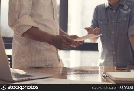 people working with business document together, selective focus and vintage tone