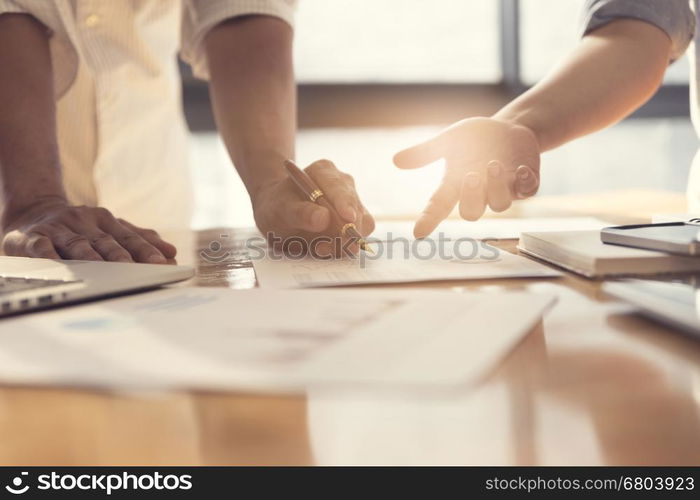 people working with business document together, selective focus and vintage tone