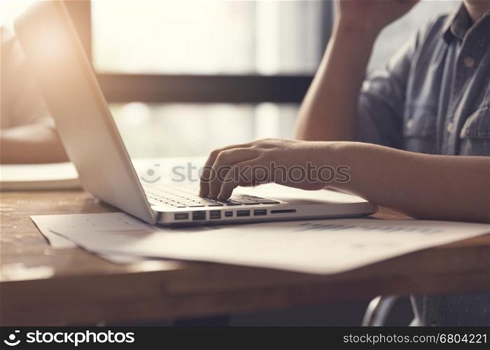 people working with laptop computer notebook, selective focus and vintage tone
