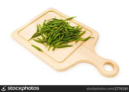 Pepper and cutting board isolated on the white