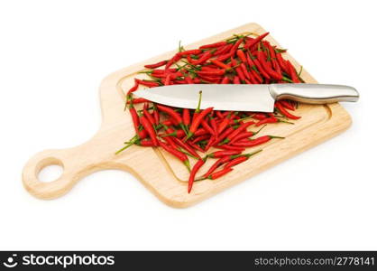 Pepper and cutting board isolated on the white