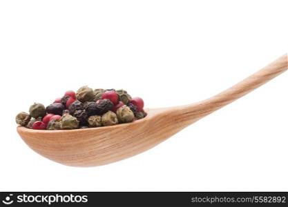 Pepper seasoning mix in wooden spoon isolated on white background cutout