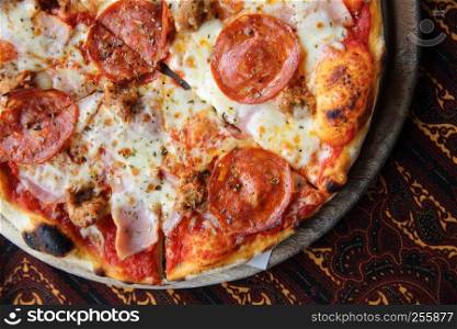 pepperoni pizza on wooden italian food