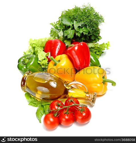 Peppers, basil, tomatoes and olive oil isolated on a white background