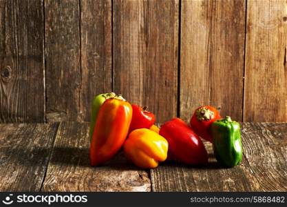 Peppers on old wooden table