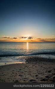 Perfect flaming seascape view from a beach at sunset. Perfect seascape view from a beach at sunset