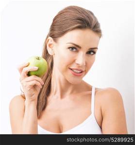 Perfect woman with apple. Beautiful young nude woman with green apple close up isolated on white background