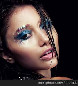 Perfect young woman - bright stylish makeup. Sensuality and beauty. Wet hair